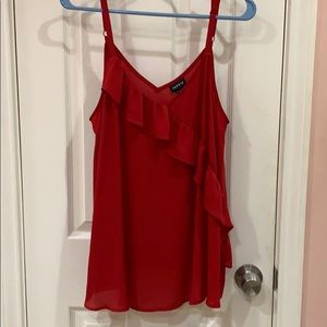 Red camisole with ruffle.